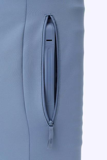 The Hybrid Carry-On Luggage Cover in Dusty Blue